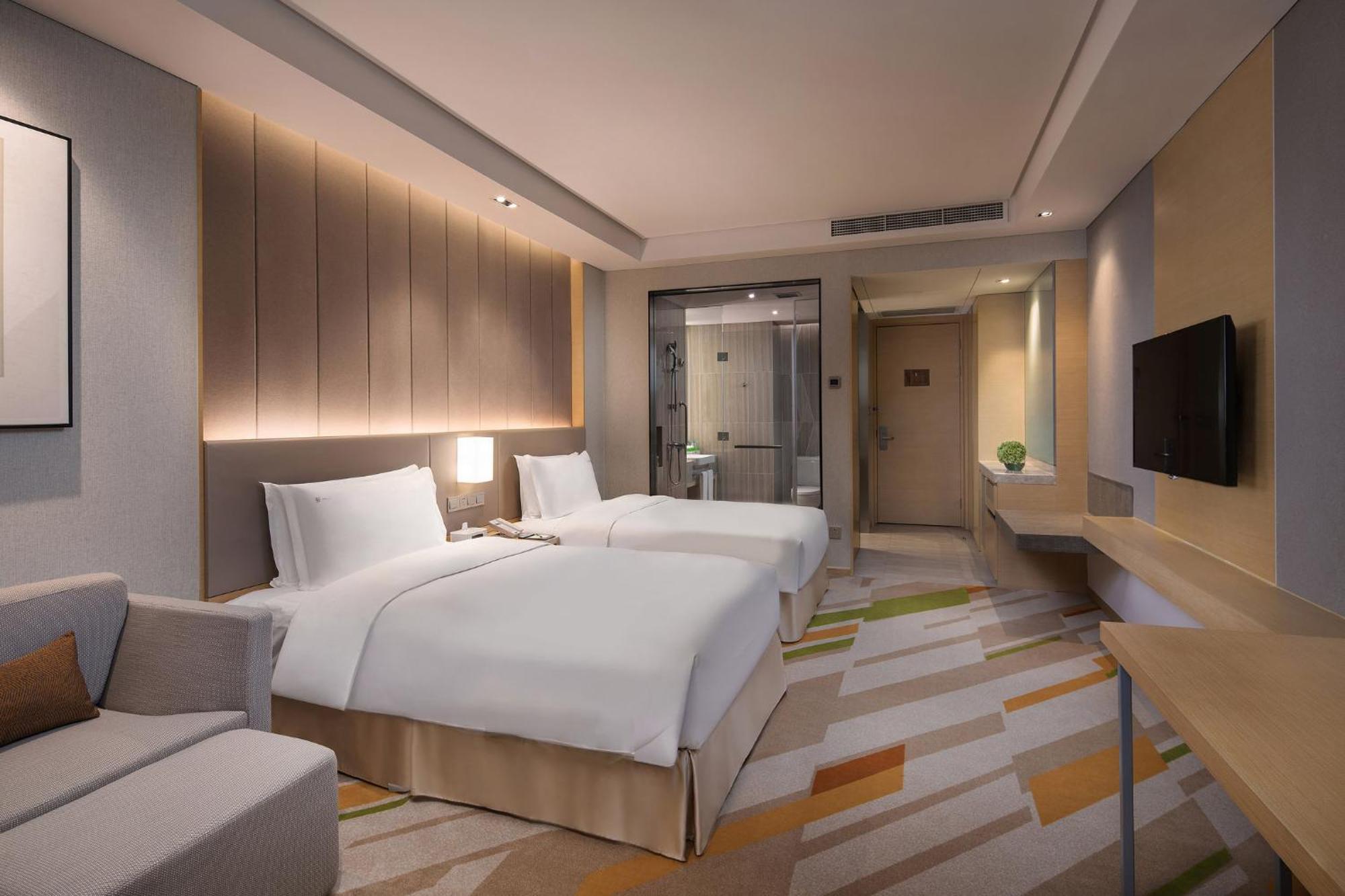 Holiday Inn Wuxi Taihu New City By Ihg Exterior photo