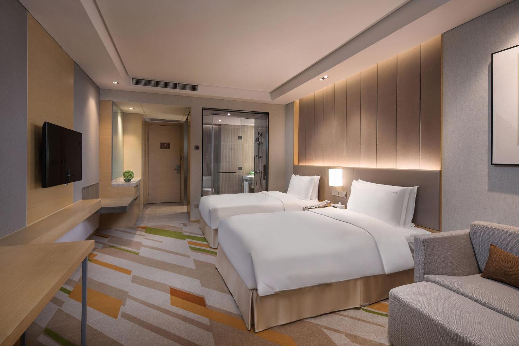 Holiday Inn Wuxi Taihu New City By Ihg Exterior photo